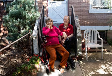 Freda Schaeffer, left, and Tom Logan have shared a three-bedroom house in Brooklyn for a year. “Freda and I are family now,” Mr. Logan said. “We need each other.” Credit Credit Jackie Molloy for The New York Times