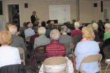 The attentive audience that filled the room.